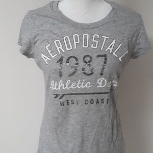 Gray Tee with silver and white lettering